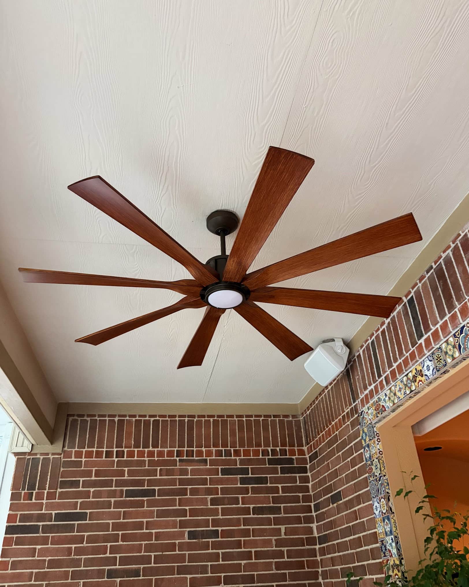 Upgraded the patio ceiling fan for better airflow and comfort.